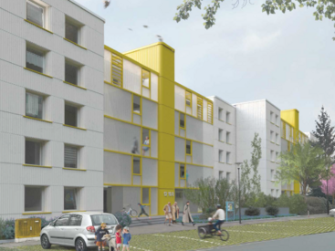 Perspektive der Eingangsseite, weiße Fassade mit Aufzugsturm in Gelb