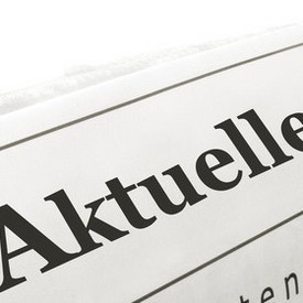 Tageszeitung mit Beschriftung "Aktuelles"